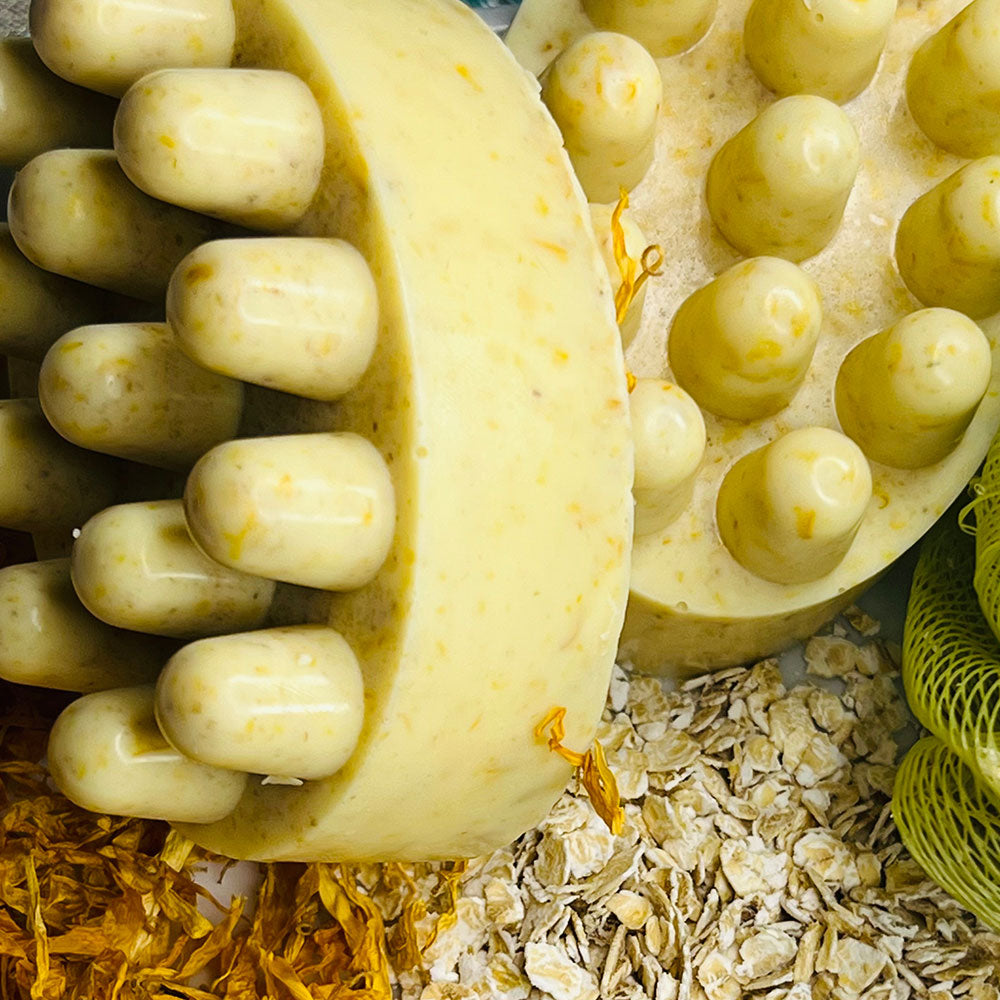 Rejuvenecedor Exfoliante y Masajeador de Avena y Flor de Caléndula Jabón